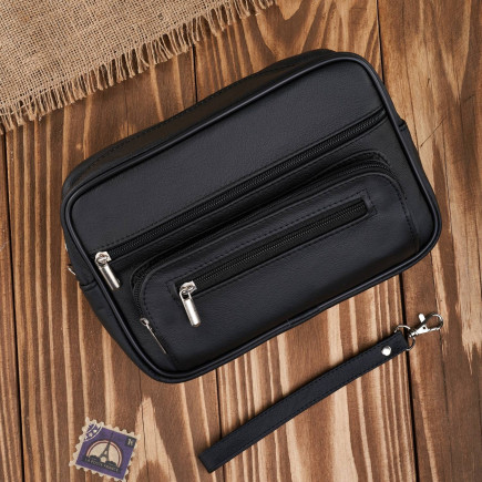 Saszetka męska skórzana do ręki praktyczna pakowna czarna Abruzzo ABR-10